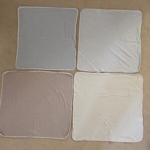 Four Magnolia Baby pima cotton blankets